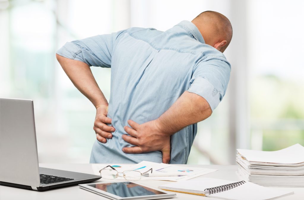Man suffering from back pain